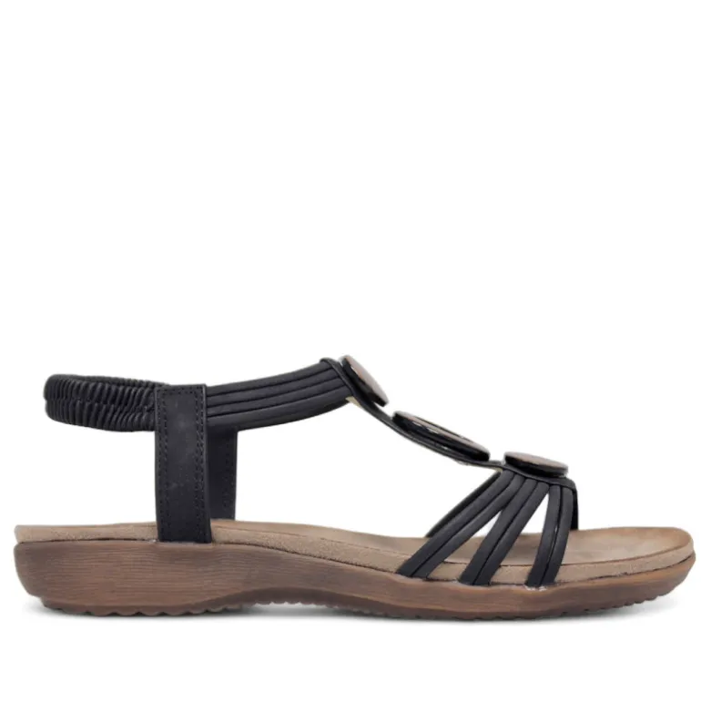 Sandalias planas Amarpies negras con abalorios de madera y pulsera elástica