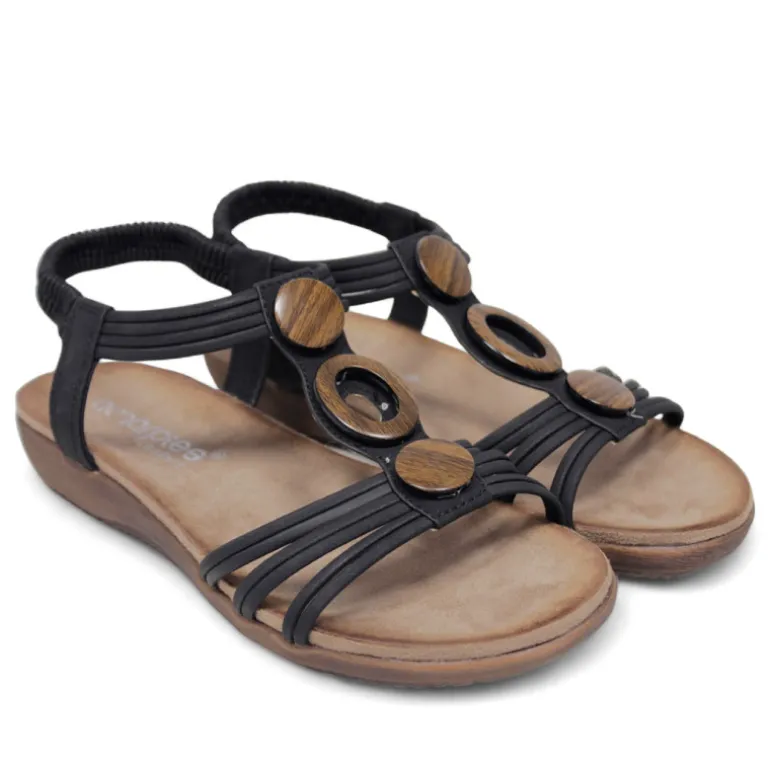Sandalias planas Amarpies negras con abalorios de madera y pulsera elástica