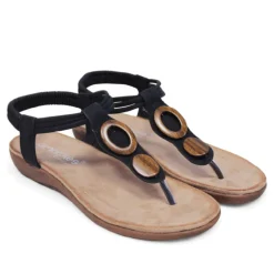 Sandalias planas Amarpies negras de dedo y cogidas al tobillo con detalles de madera